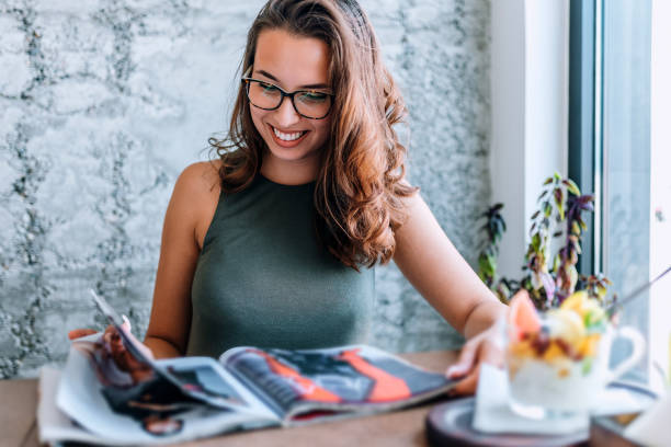 Woman reading a magazine
